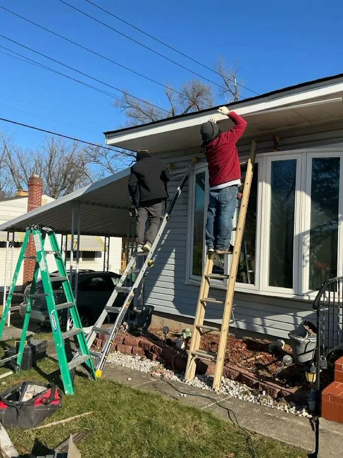 Restoration crew performing exterior repair in Manville